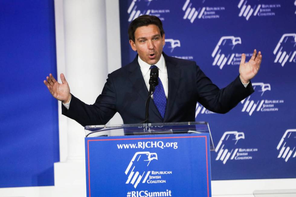 Republican presidential candidate Florida Gov. Ron DeSantis walks on stage during the annual Re ...