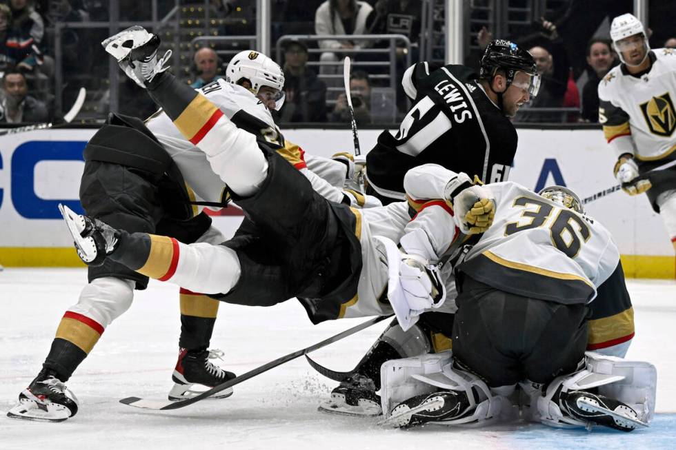 Los Angeles Kings center Trevor Lewis (61) scores as Vegas Golden Knights defenseman Nicolas Ha ...