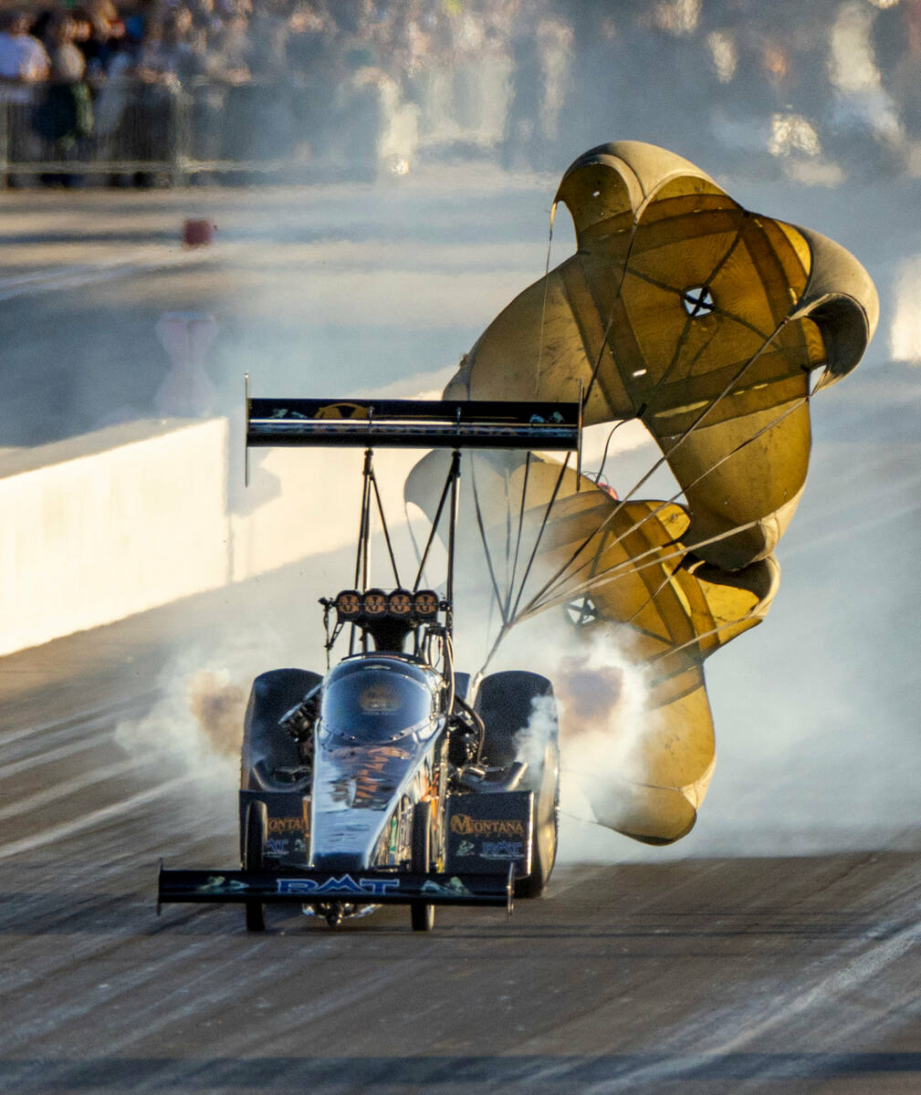 Austin Prock deploys his parachute during a Top Fuel qualifying session in the NHRA Nevada Nati ...