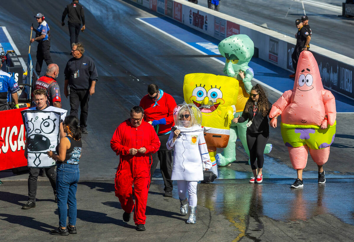 A race team dress like characters from SpongeBob SquarePants during a qualifying session in the ...