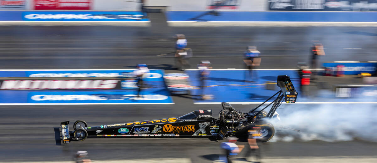 Austin Prock burns his tires during a Top Fuel qualifying session in the NHRA Nevada Nationals ...