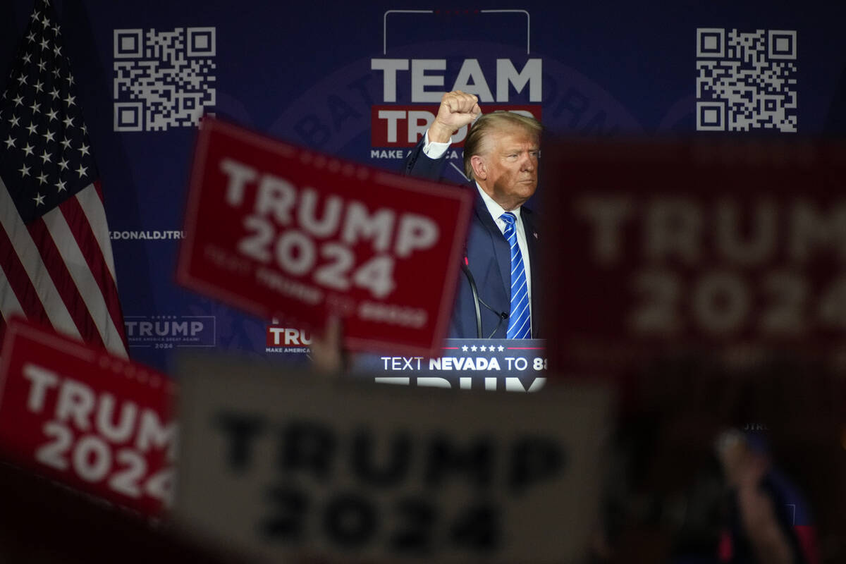 Republican presidential candidate and former President Donald Trump gestures to the crowd as he ...