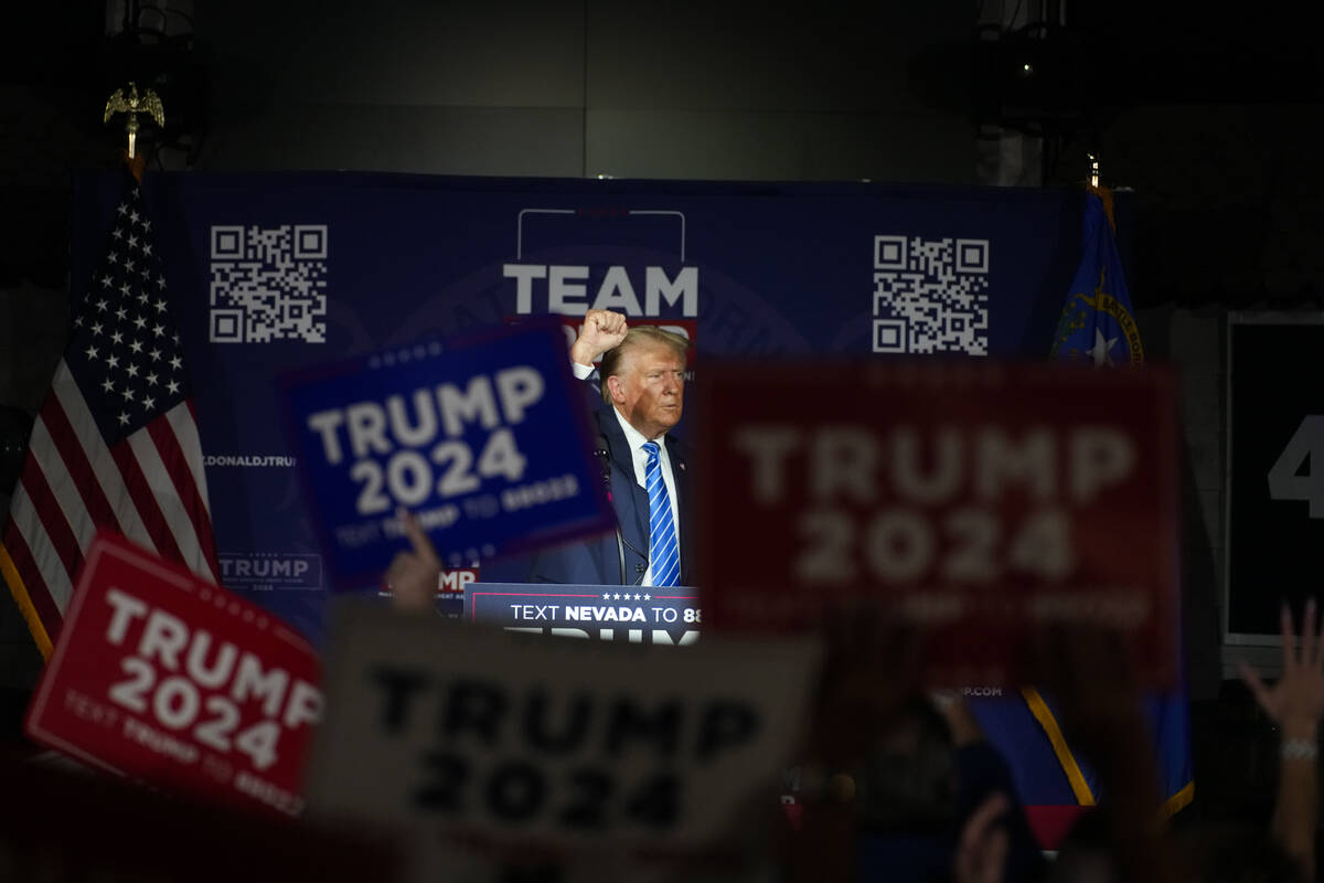 Republican presidential candidate and former President Donald Trump gestures to the crowd as he ...