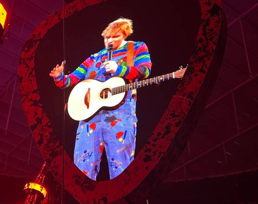 Ed Sheeran, in his Chucky costume for Halloween, is shown at Allegiant Stadium on Saturday, Oct ...