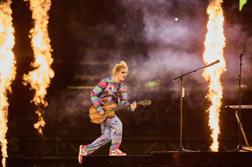 Ed Sheeran, in his Chucky costume for Halloween, is shown at Allegiant Stadium on Saturday, Oct ...