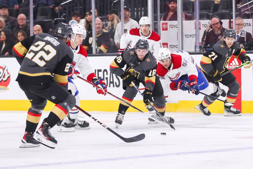 Golden Knights left wing Pavel Dorofeyev (16) and Montreal Canadiens defenseman Jordan Harris ( ...