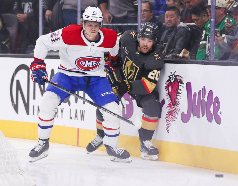 Golden Knights center Chandler Stephenson (20) and Montreal Canadiens defenseman Kaiden Guhle ( ...