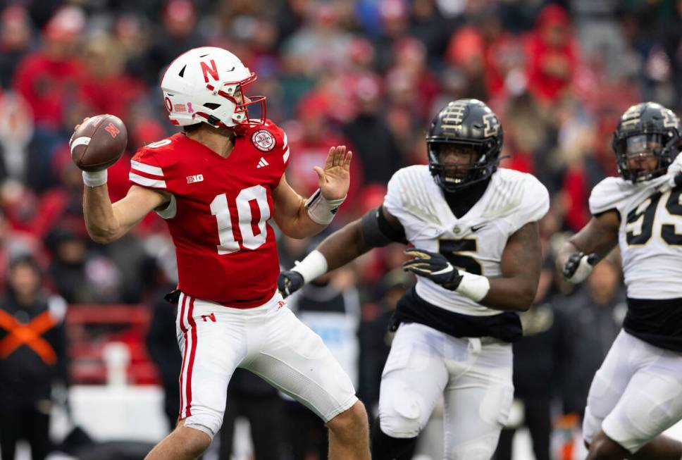 Nebraska quarterback Heinrich Haarberg (10) looks to pass the ball against Purdue during the se ...