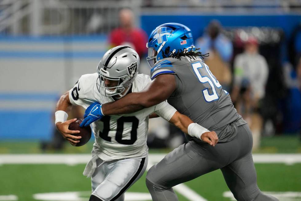 Detroit Lions defensive tackle Alim McNeill (54) sacks Las Vegas Raiders quarterback Jimmy Garo ...