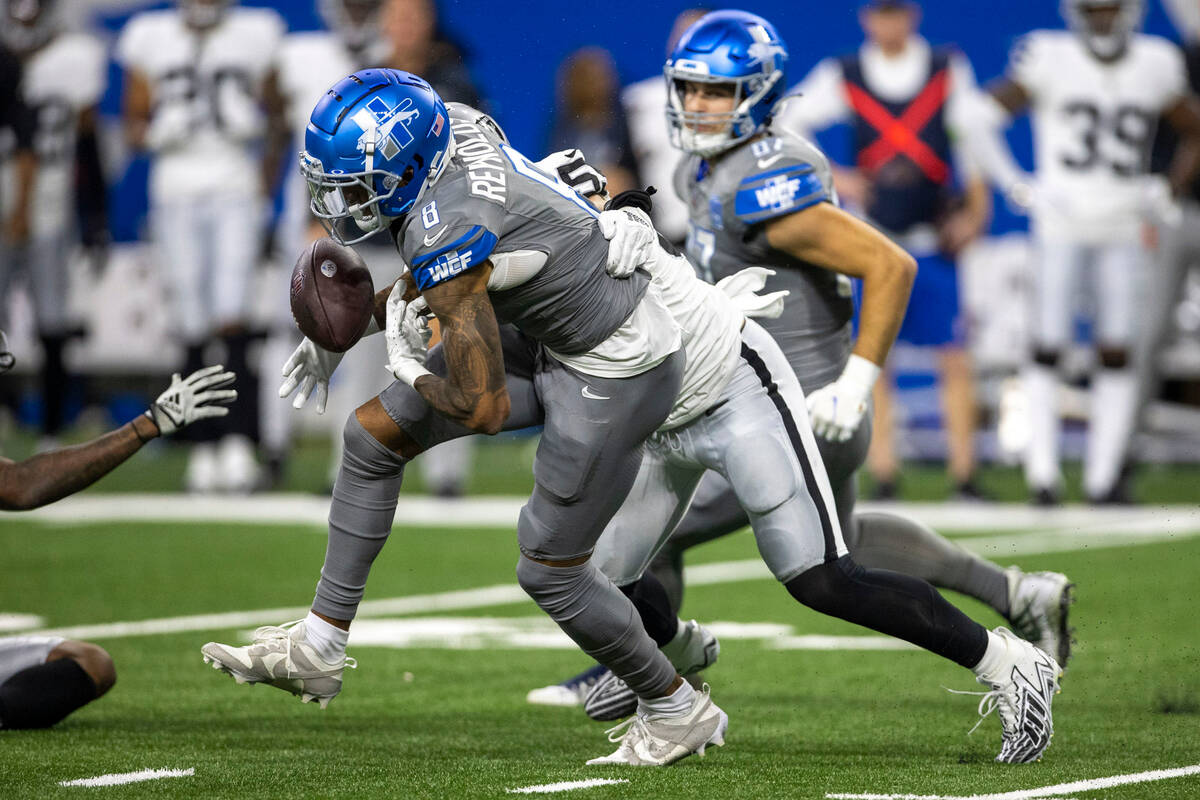 Raiders linebacker Luke Masterson (59) forces Detroit Lions wide receiver Josh Reynolds (8) to ...