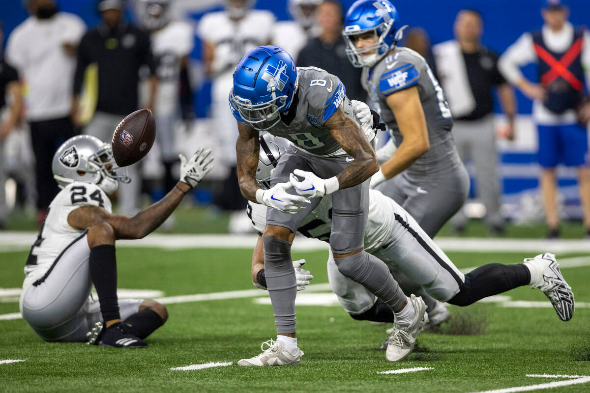 Raiders linebacker Luke Masterson (59) forces Detroit Lions wide receiver Josh Reynolds (8) to ...