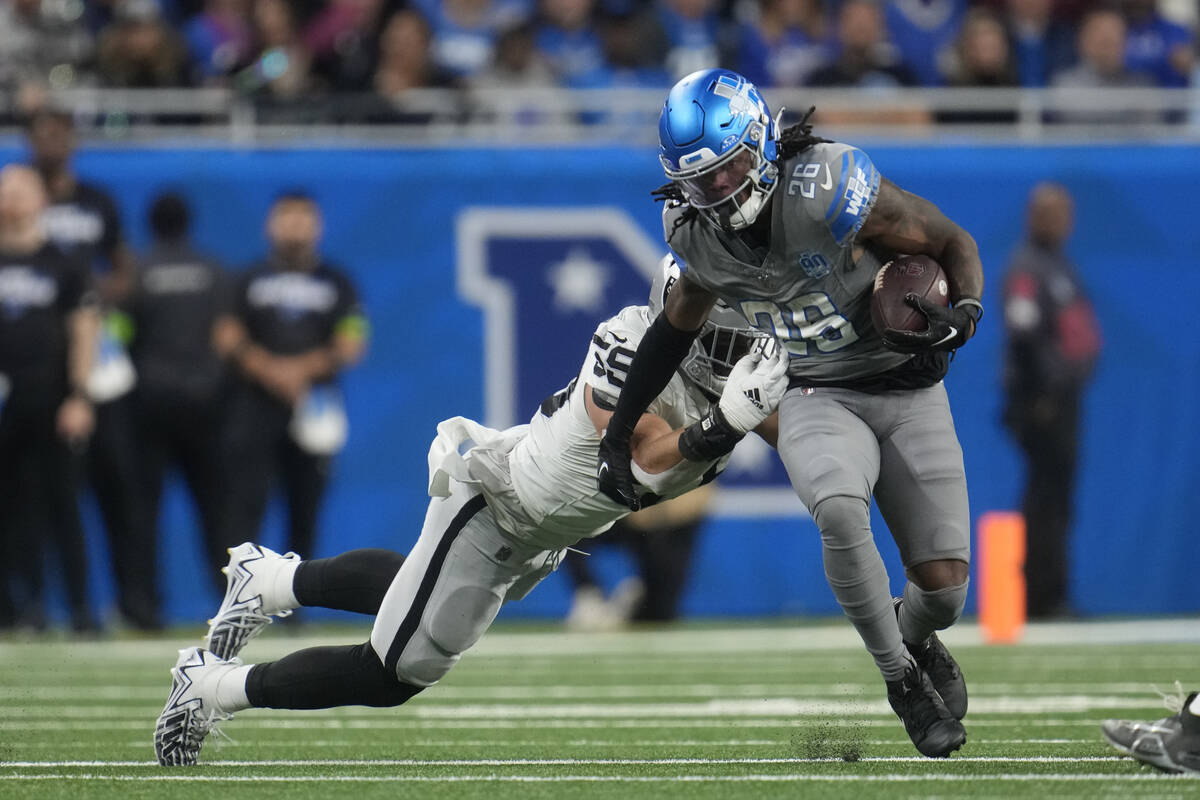 Las Vegas Raiders linebacker Luke Masterson (59) stops Detroit Lions running back Jahmyr Gibbs ...