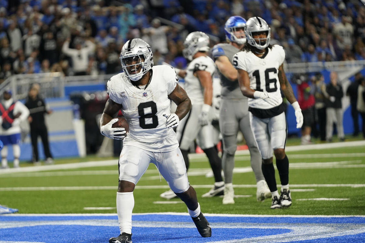 Las Vegas Raiders running back Josh Jacobs (8) reacts after his three-yard rushing touchdown du ...