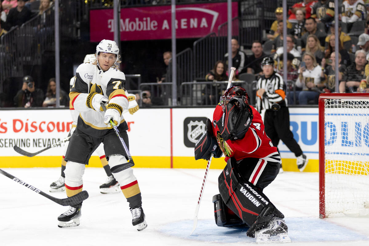 Golden Knights center William Karlsson (71) scores a goal on Blackhawks goaltender Petr Mrazek ...