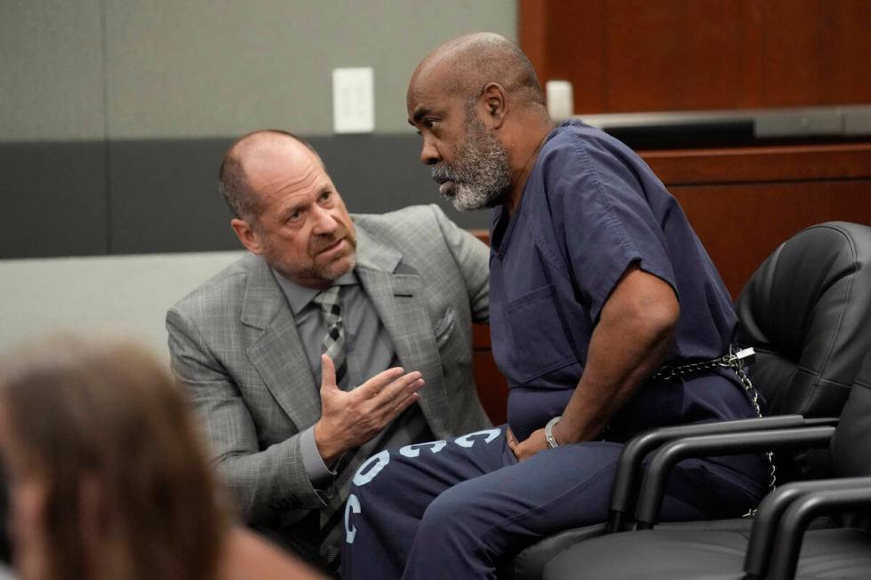 Duane “Keffe D” Davis, right, speaks with attorney Ross Goodman in court Thursday ...