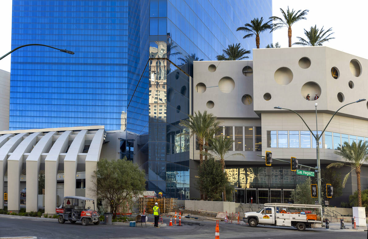 Construction workers are busy with projects nearing the end about the exterior at the Fontaineb ...