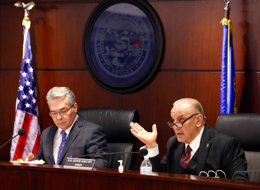 The Nevada Control Board Chairman Kirk Hendrick, left, listens to Gaming Control Board member G ...