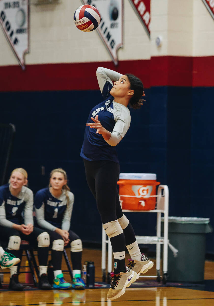 Shadow Ridge outside hitter Desirae Noble sets the ball during a Class 5A Southern Region volle ...