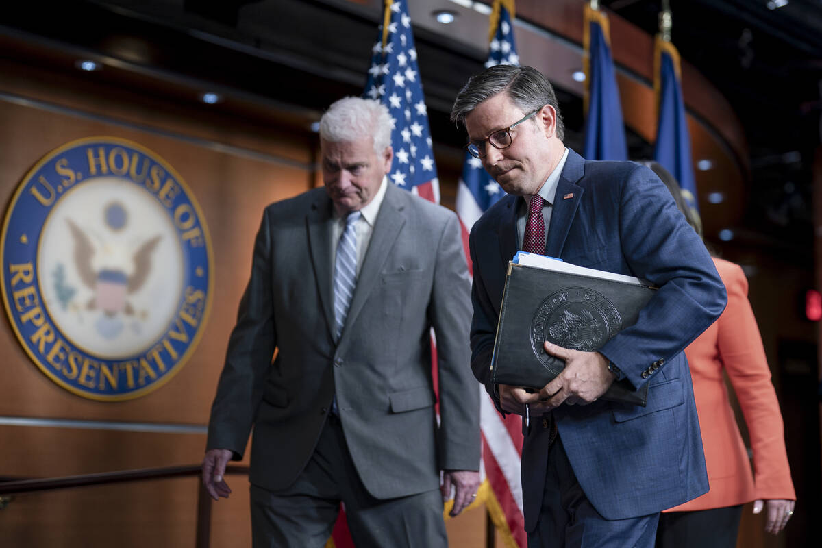 Speaker of the House Mike Johnson, R-La., joined at left by Majority Whip Tom Emmer, R-Minn., l ...