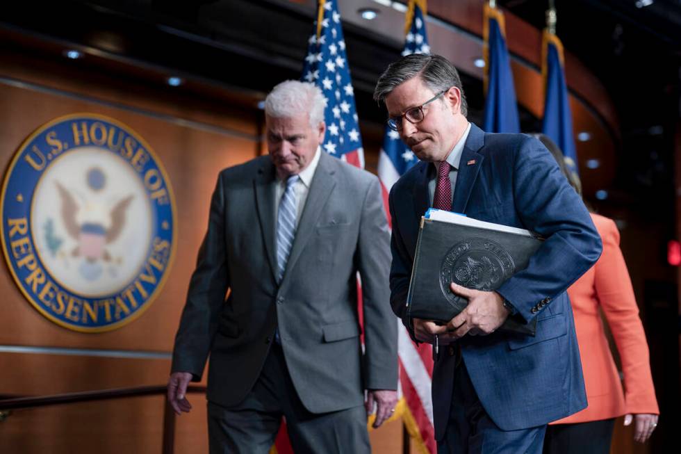 Speaker of the House Mike Johnson, R-La., joined at left by Majority Whip Tom Emmer, R-Minn., l ...