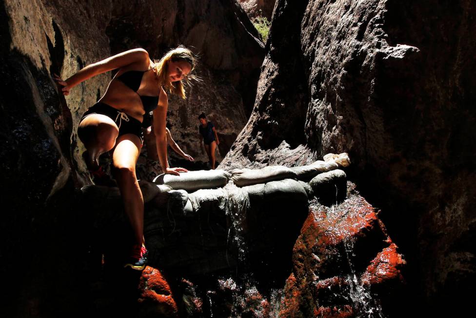 Gilliane Holt explores some hot springs with her friends while hiking near the Black Canyon Wat ...