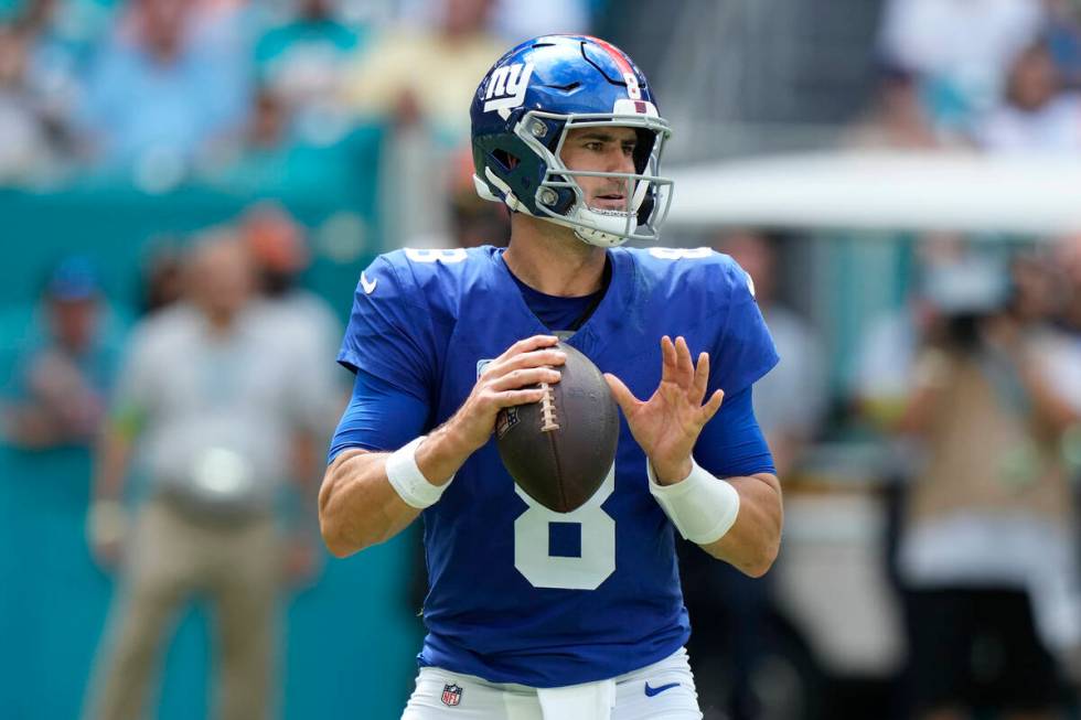 New York Giants quarterback Daniel Jones (8) looks to pass during an NFL football game against ...