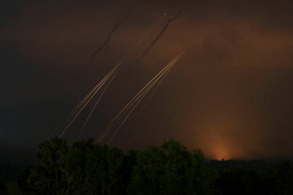 Smoke rises following an Israeli airstrike in the Gaza Strip, as seen from southern Israel, Thu ...