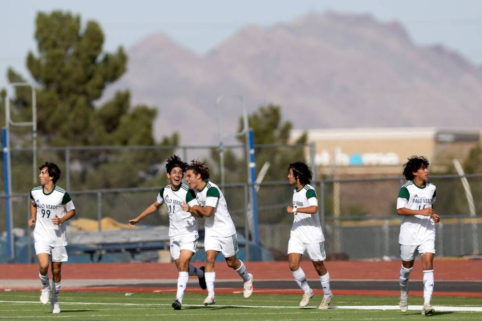 Palo Verde’s Justin Geracci (11) and Francesco Traniello (10) celebrate a goal during th ...