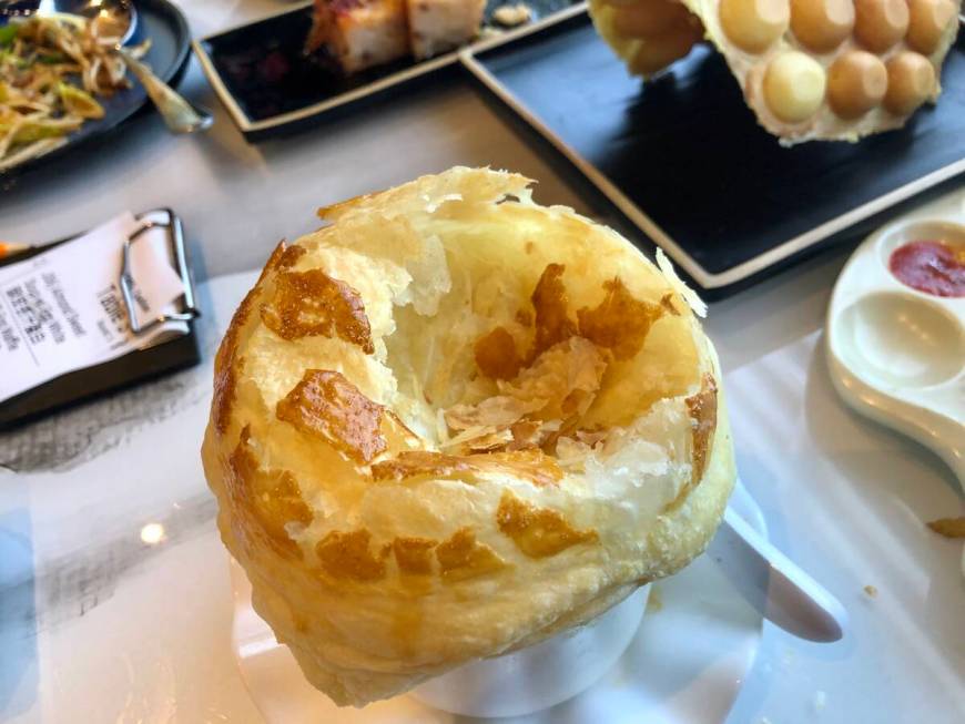 Almond sweet soup is kept warm by a pastry cloche at Palette Tea Lounge in Chinatown Las Vegas. ...