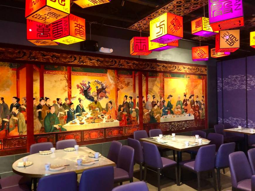 A mural of a classical Chinese courtly scene stretches along one wall of Palette Tea Lounge in ...