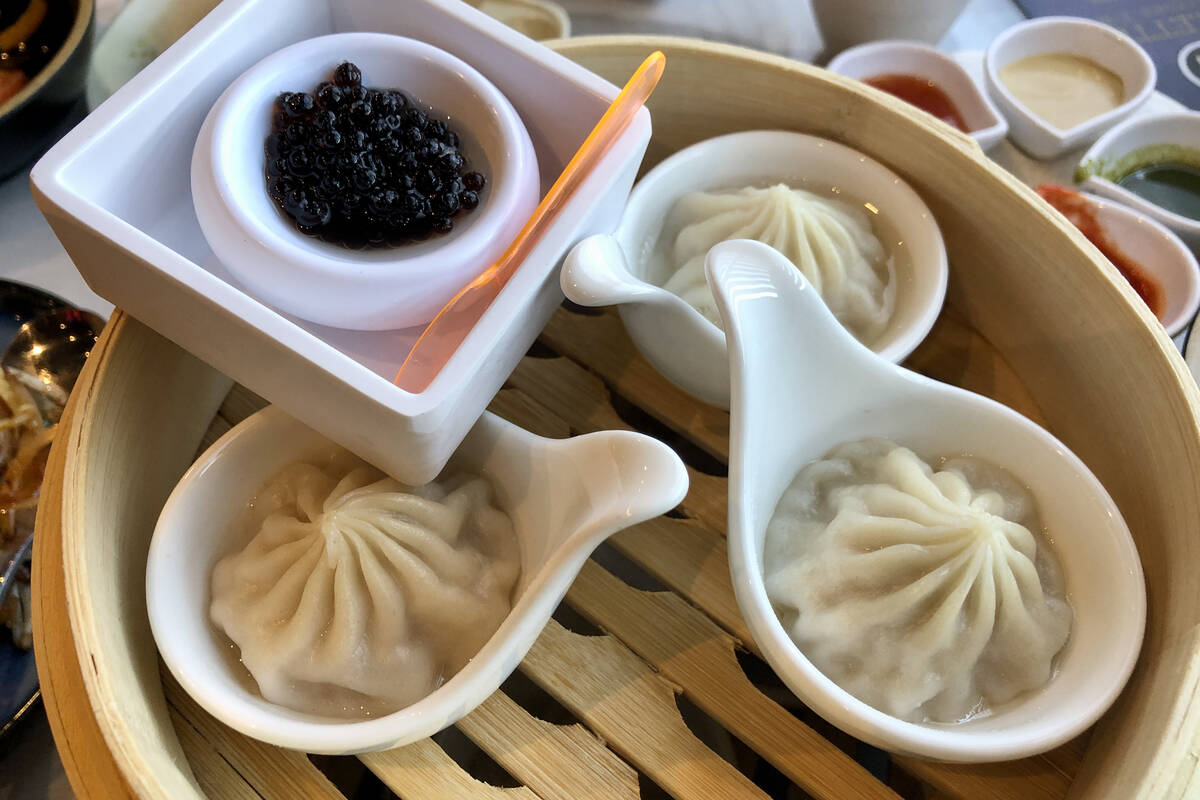 At the new Palette Tea Lounge in Chinatown Las Vegas, xiao long bao are served with gelatinized ...