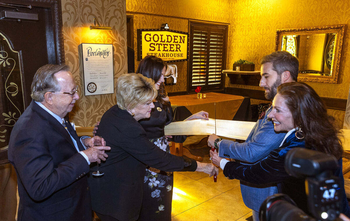 A ribbon is cut during an event to celebrate the first expansion in nearly 50 years at the Gold ...