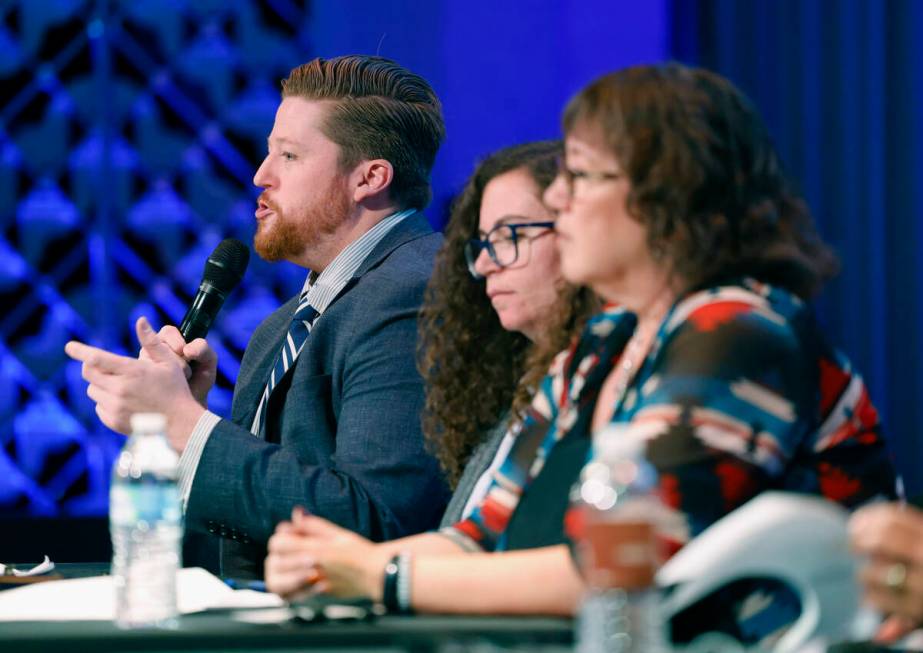 Trevor Macaluso, left, CEO at Eddy House, speaks as Melissa Jacobowitz, chief of development an ...