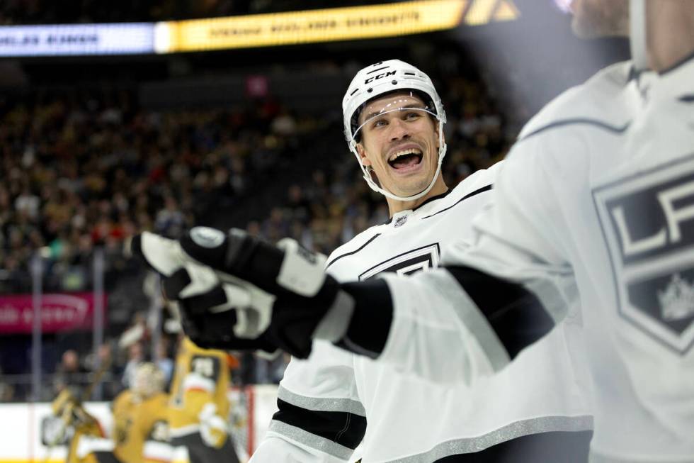 Kings defenseman Andreas Englund (5) skates to celebrate Kings center Adrian Kempe’s goa ...