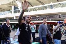 Mercedes driver Lewis Hamilton of Britain waves to fans at the end of the Brazilian Formula One ...