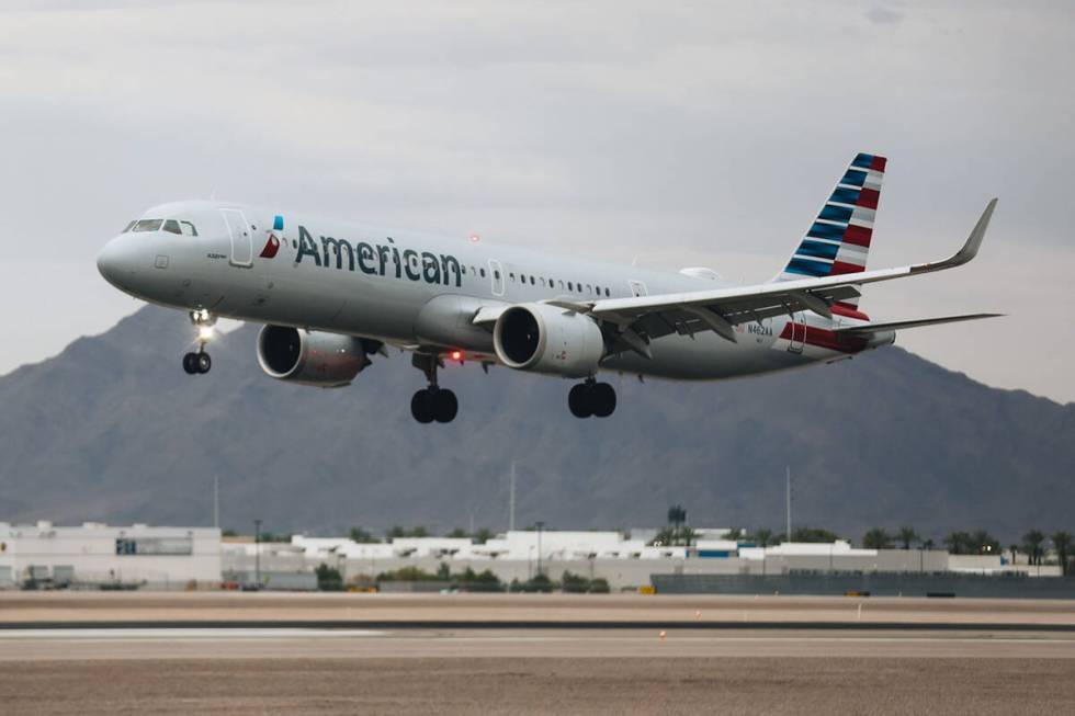 An airplane flies into Harry Reid International Airport on Saturday, August 19, 2023, in Las Ve ...