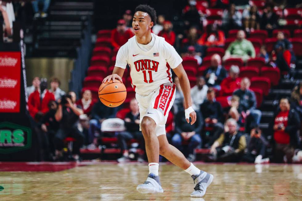 UNLV guard Dedan Thomas Jr. (11) dribbles the ball down the court during a game against Souther ...