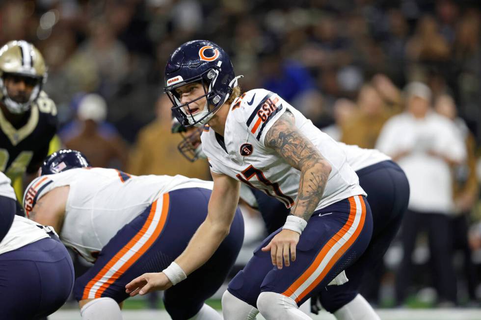 Chicago Bears quarterback Tyson Bagent (17) calls out a play during an NFL football game agains ...