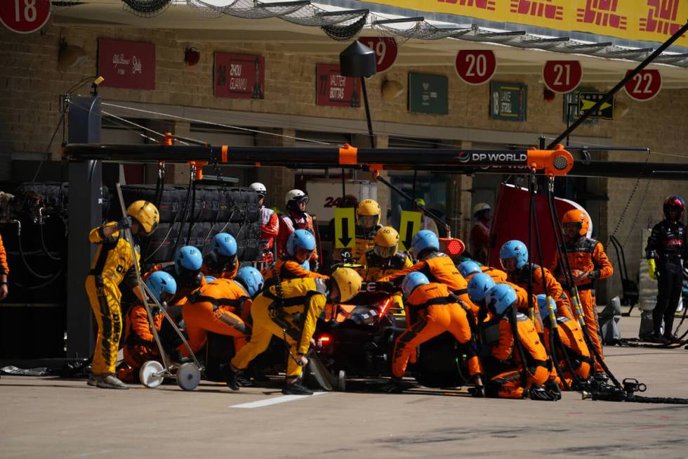 McLaren driver Lando Norris, of Britain, makes a pit stop during the F1 U.S. Grand Prix auto ra ...