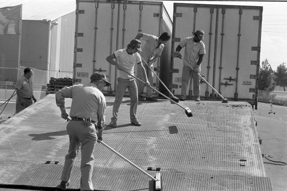 Trucks lined up to unpack and drop off the Formula One race cars and racecar teams. (Las Vegas ...