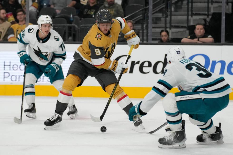 Vegas Golden Knights center Jack Eichel (9) skates around San Jose Sharks defenseman Mario Ferr ...