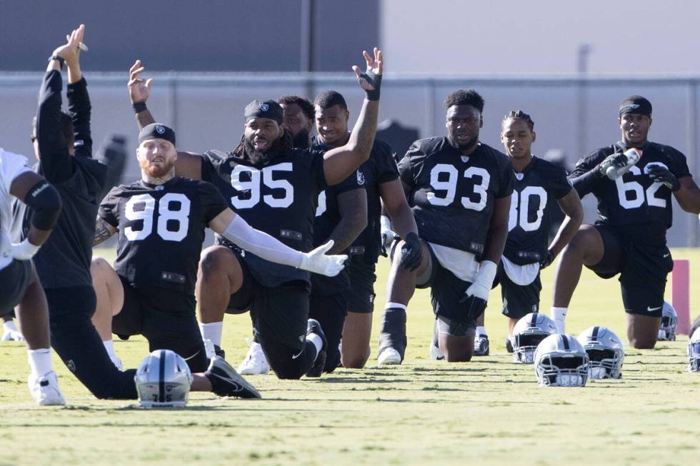 Raiders defensive players Maxx Crosby (98), John Jenkins (95), Nesta Jade Silvera (99), Tyree W ...