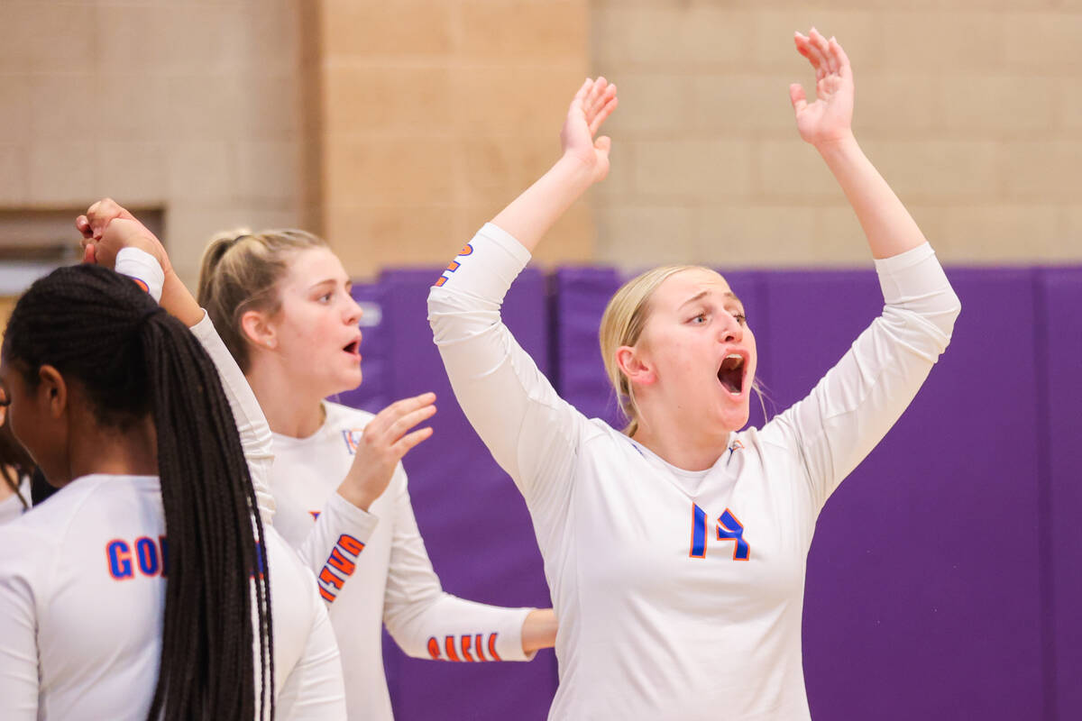 Bishop Gorman players get emotional as the class 5A girls volleyball state title match between ...