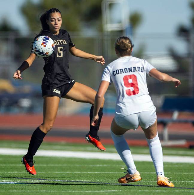 Faith Lutheran defender Gwen Flemington (15) looks t5o control the ball against Coronado midfie ...