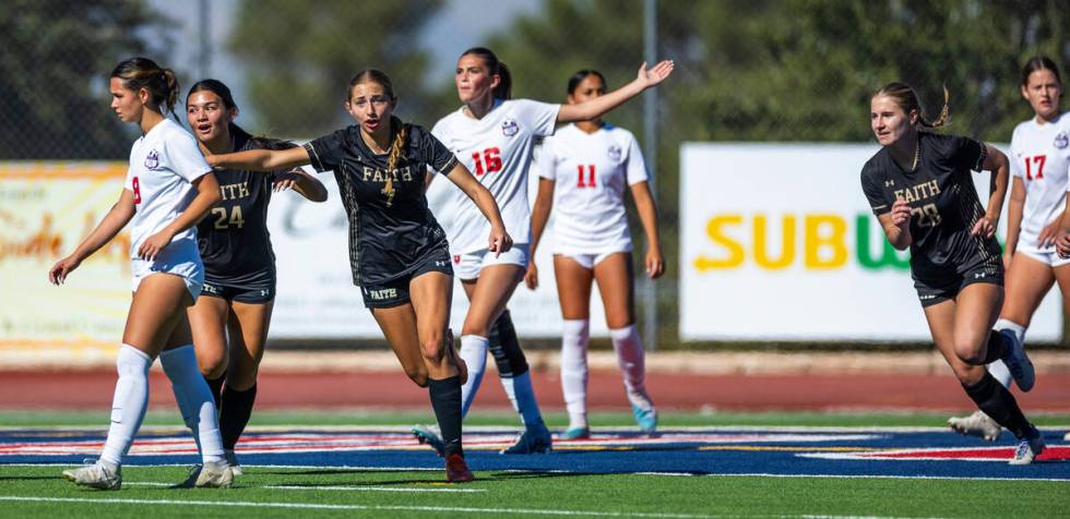 Faith Lutheran players celebrate their goal against Coronado during the second half of their Cl ...