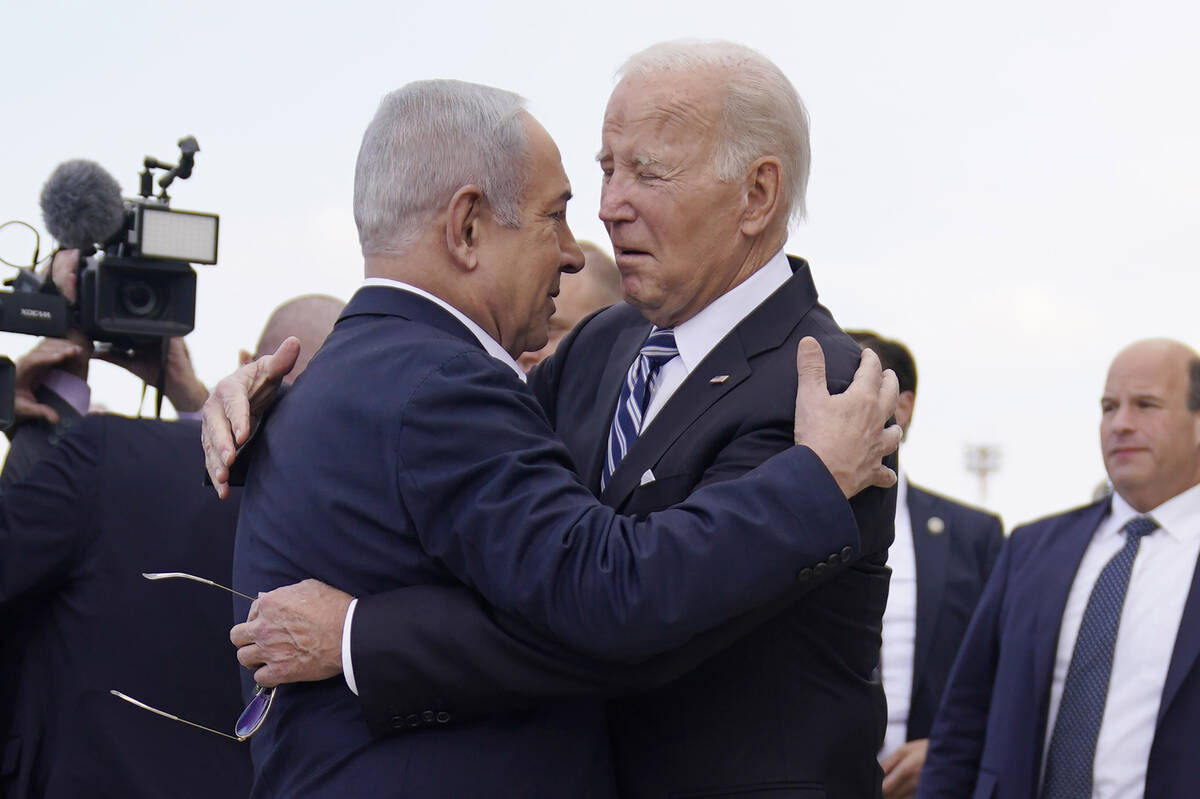 FILE - President Joe Biden is greeted by Israeli Prime Minister Benjamin Netanyahu after arrivi ...