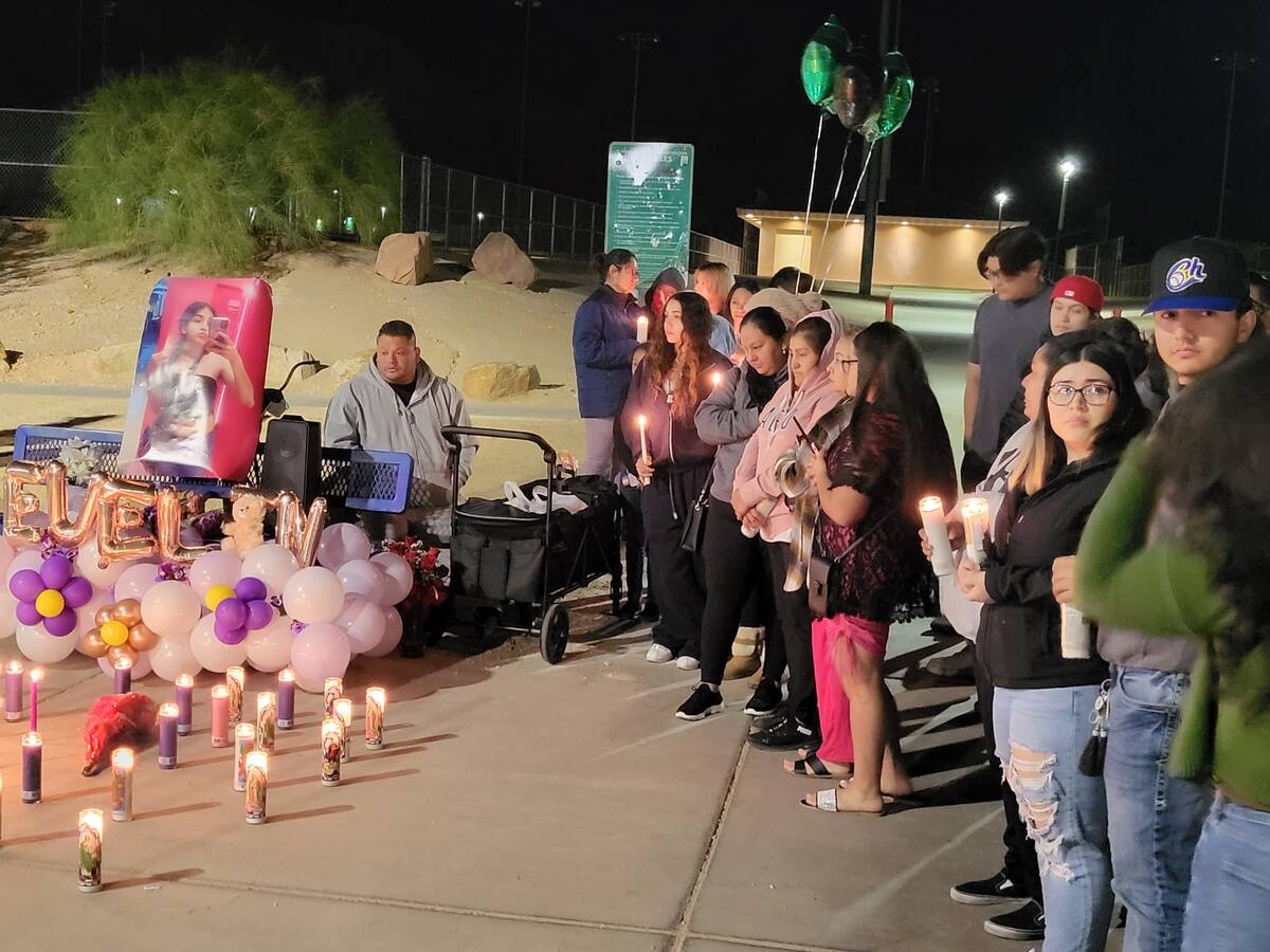 Family and friends gathered at Hollywood Park for a vigil to remember Evelin Casas, 16, whose b ...