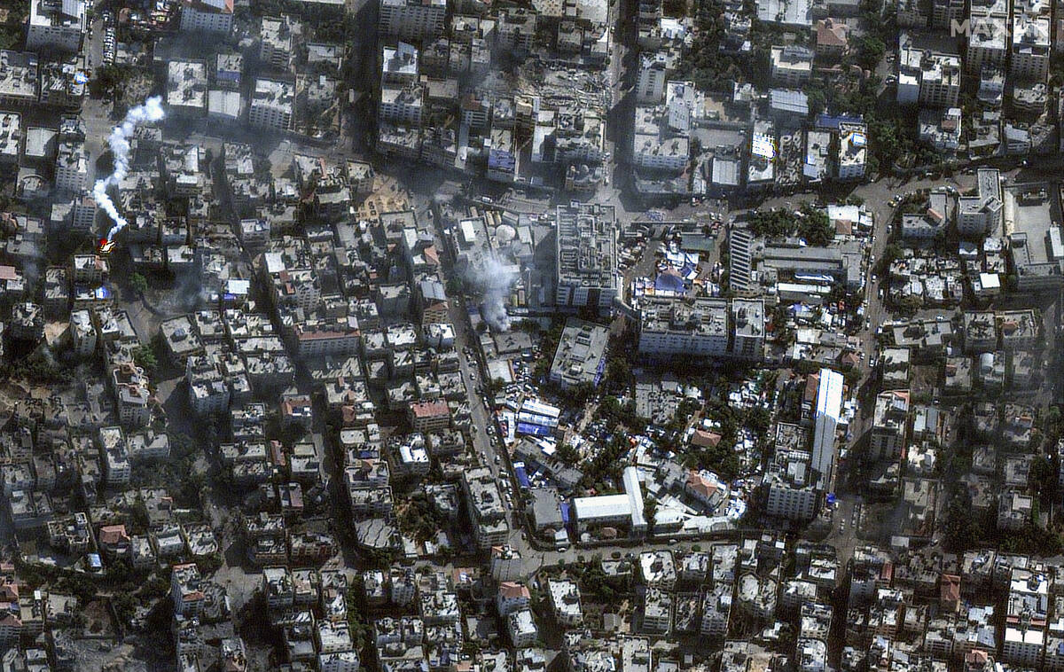 This image provided by Maxar Technologies shows al-Shifa hospital and surroundings in Gaza City ...