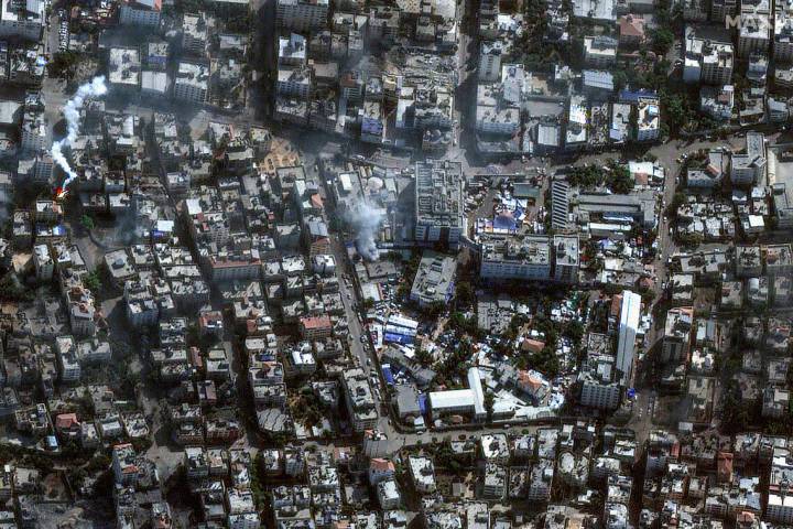 This image provided by Maxar Technologies shows al-Shifa hospital and surroundings in Gaza City ...