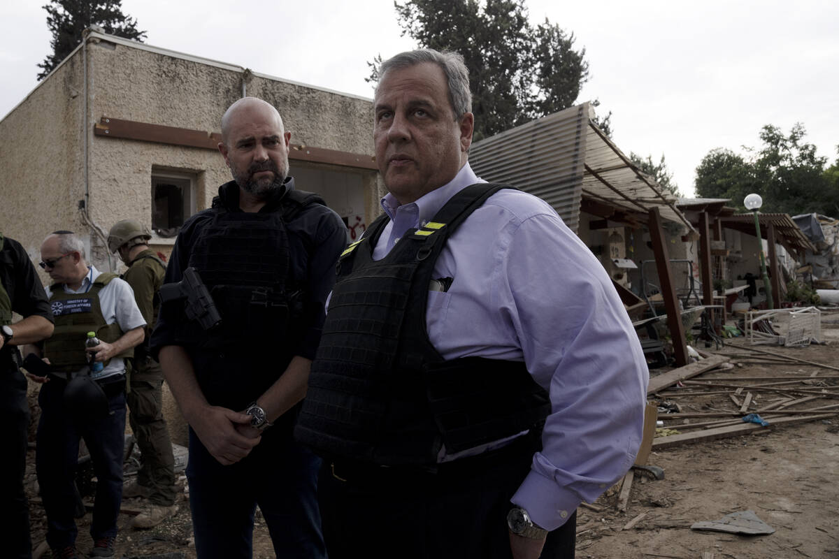 Former New Jersey Governor Chris Christie, right, makes remarks at the end of a visit to Kibbut ...